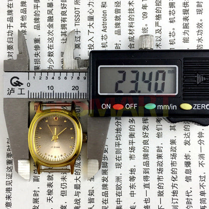 Shanghai brand 23mm manual mechanical lady watch with golden nail markers and gradient brown dial, elegant design for everyday wear.