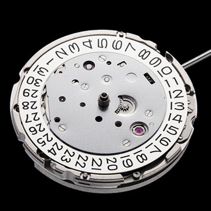 Miyota Citizen 9015 automatic watch movement with date windows at 3 and 6 o?clock, Japan made.