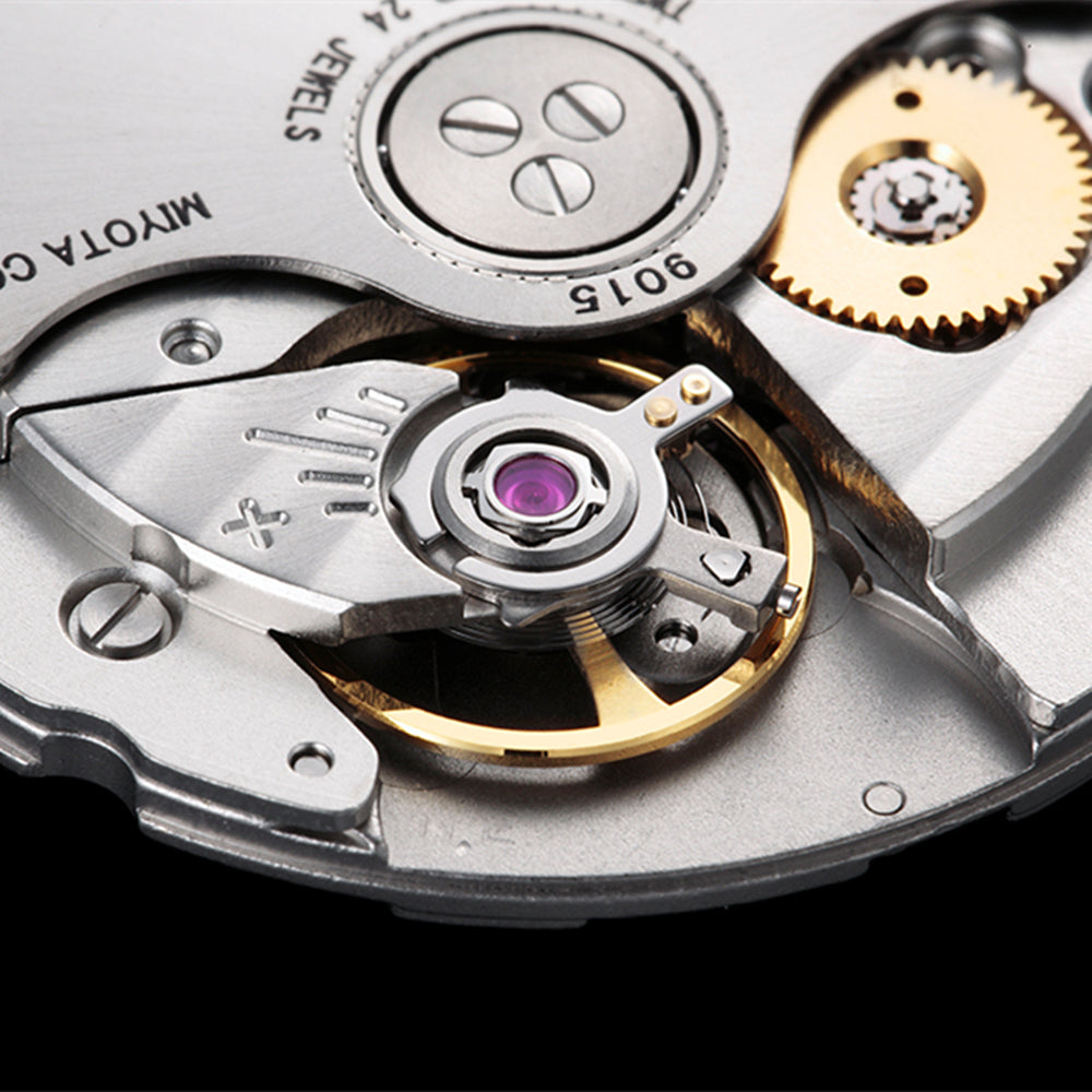 Miyota Citizen 9015 automatic watch movement showing date display at 3 and 6 o?clock, Japan made.