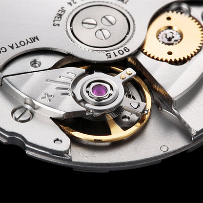 Miyota Citizen 9015 automatic watch movement showing date display at 3 and 6 o?clock, Japan made.