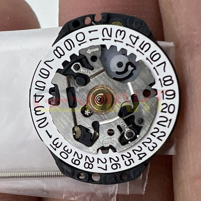 Hattori Epson TMI VX82E quartz watch movement with date display at 3 o'clock, Japan made