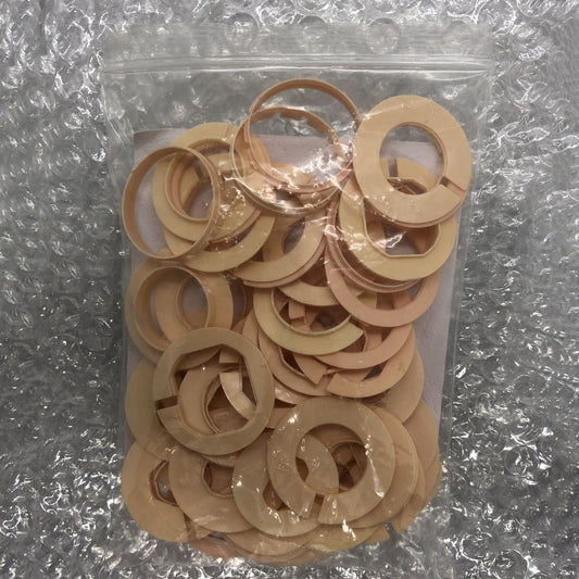 Set of 54 watch movement case spacers, various 27 ligne sizes by AC-676, for precise casing and repairs