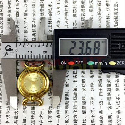 22mm Shanghai Lady Watch with golden nail markers, round gold case, and manual mechanical movement for elegant timekeeping.