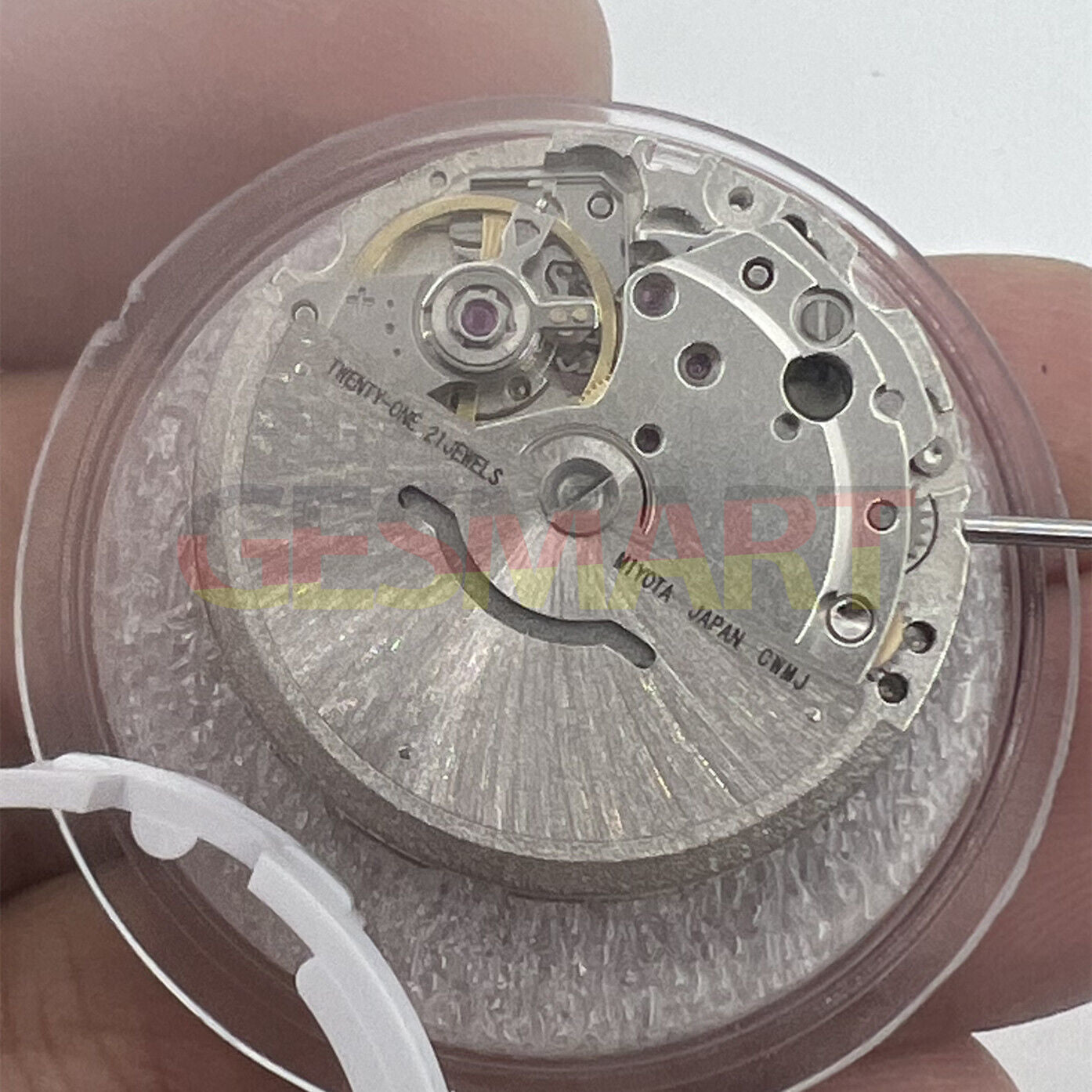 Miyota/Citizen 8215 automatic watch movement with black dial, date at 6, precision Japanese craftsmanship.