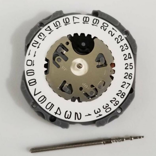 Hattori Epson quartz watch movement with date display at 3/6, precision Japan made component.