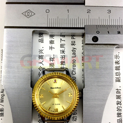 Shanghai 24mm ladies manual watch featuring gold nail markers and a round gold case with elegant 3-hand movement.