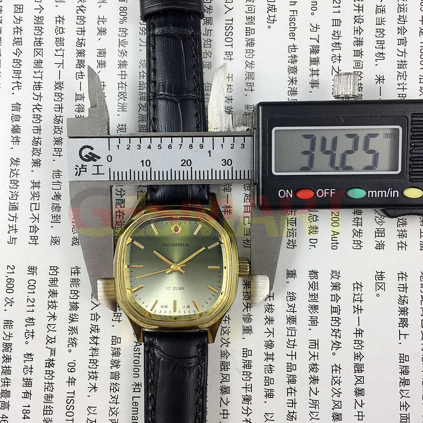 Shanghai 33mm manual mechanical watch with golden nail markers and gradient green dial, 17 jewels for elegant style.