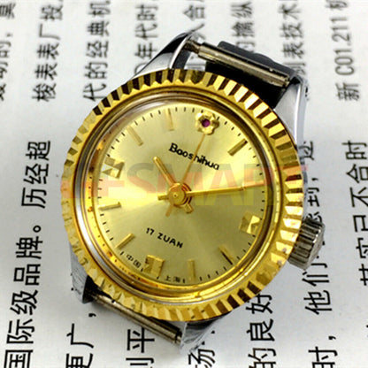 Shanghai 24mm ladies manual watch with golden nail markers and round gold case, elegant 3-hand movement design.