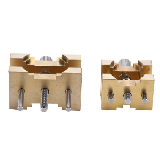 1. Vintage copper watch movement holder clamp for precise watchmaker repairs.  