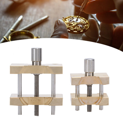 Vintage copper watch movement holder clamps set, perfect for precise watchmaker repairs and adjustments.