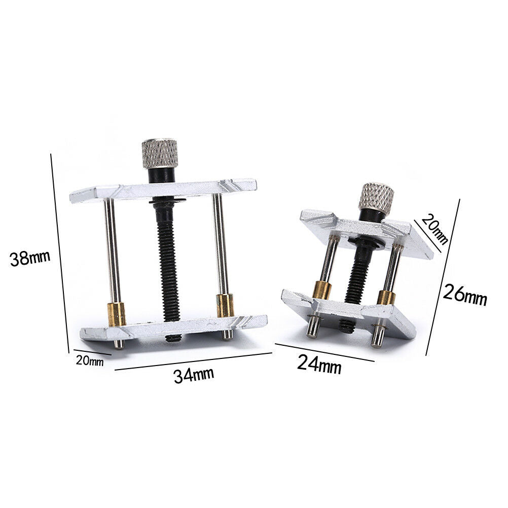 Precision metal watch movement holder clamp, ideal for secure watch repairs and adjustments.