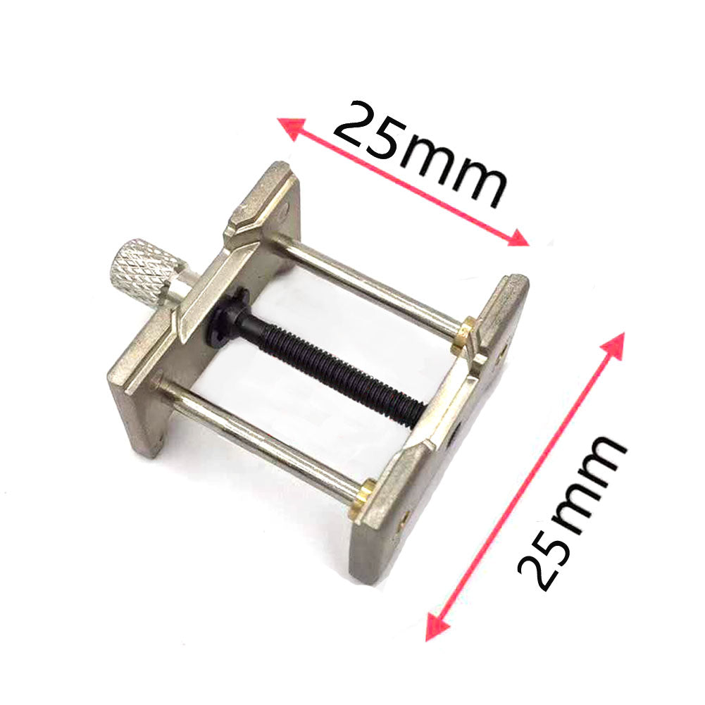 1. Adjustable metal watch movement case holder bracket for precise watchmaker repairs.  