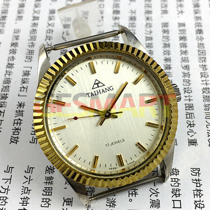 38mm TAIHANG manual mechanical watch with golden nail markers, silver round dial, and 17 jewels movement.