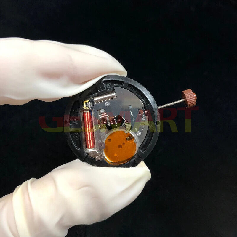 Swiss Made RONDA 517 quartz watch movement with date display at 3 and 6 o'clock positions.