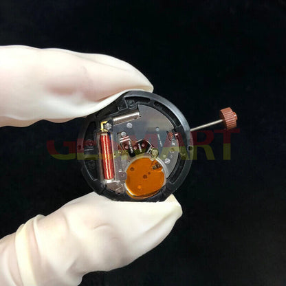 Swiss Made RONDA 517 quartz watch movement with date display at 3 and 6 o'clock positions.