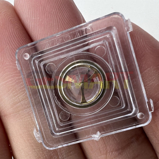 Golden balance wheel with hairspring for Orient 46941/46943 watch movement, precision replacement part.