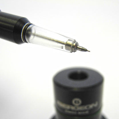 Bergeon 7720-5 automatic watch oiler for precise mechanical watch lubrication and maintenance.