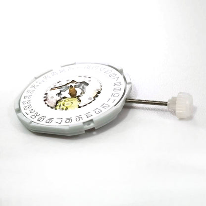 Sunon PE28 quartz watch movement with 3 hands and date window at 3 o'clock, precise timekeeping.