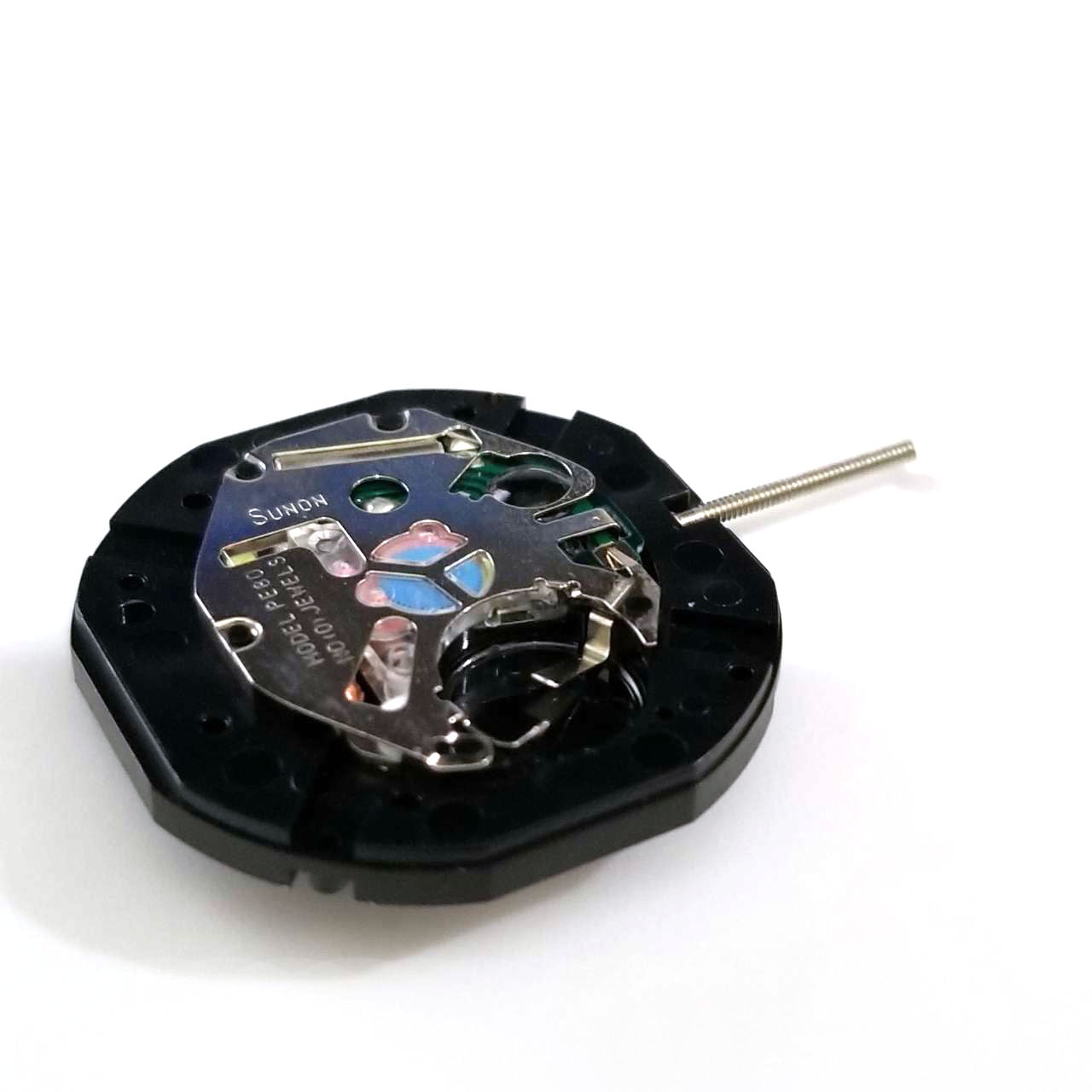 Sunon PE80 quartz watch movement with three hands, precision part for watch repair and assembly.