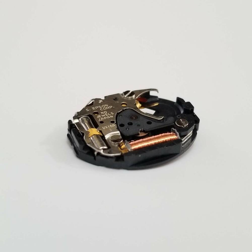 S. Epson VX10 quartz movement watch part for accurate timekeeping in watch repairs.