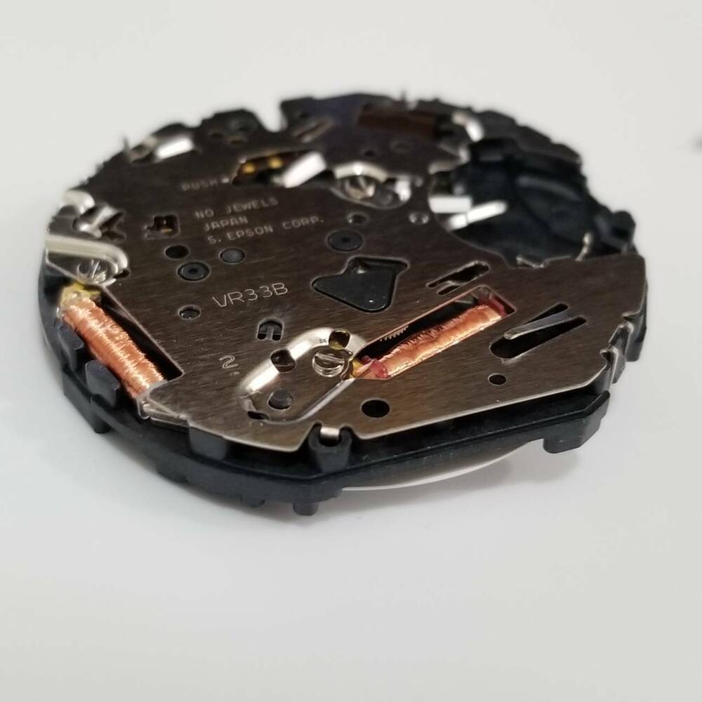 S. Epson VR33 quartz watch repair part showcasing precise movement component for accurate timekeeping.