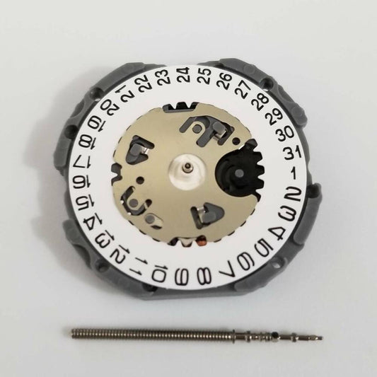 Hattori Epson TMI VJ12B quartz watch movement with date display at 3, Japan made precision.