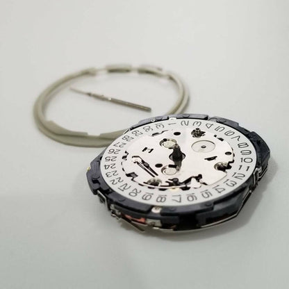 Epson YM92 quartz watch movement replacement part for precise timekeeping in watch repair.