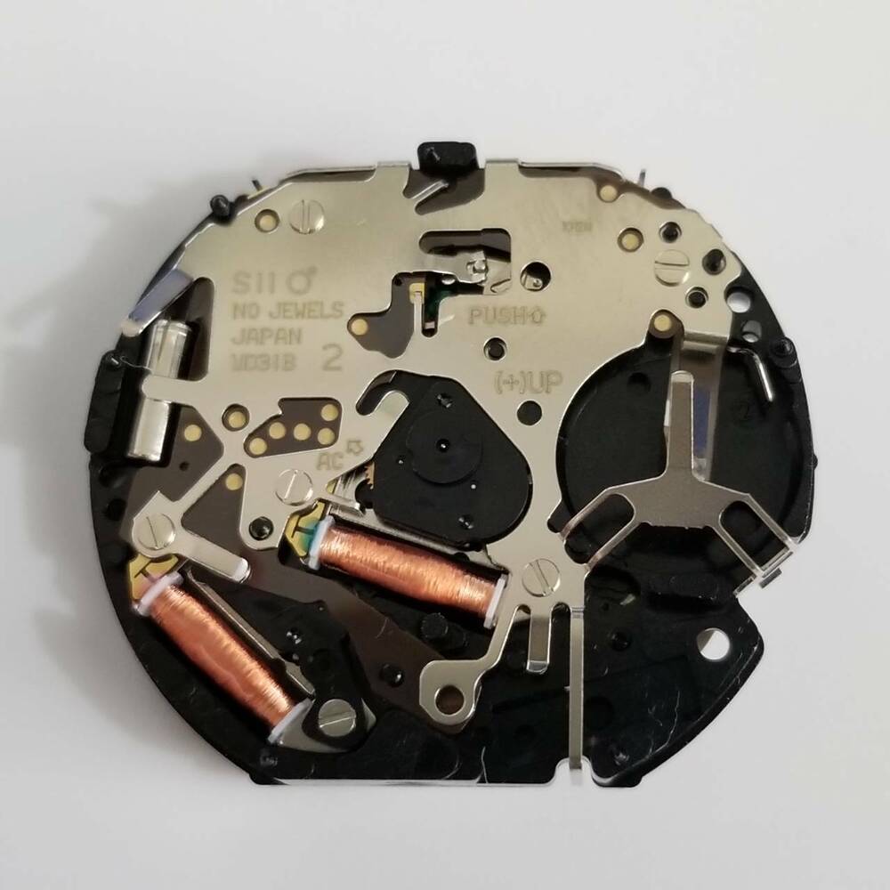 Hattori Epson VD31A quartz watch movement with precision Japan-made mechanism for reliable timekeeping.