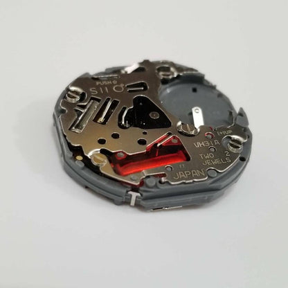 Hattori Epson VH31A quartz watch movement, precise Japanese mechanism for accurate timekeeping.
