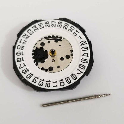 Hattori Epson TMI PC32 quartz watch movement with date at 3, precision Japan-made mechanism