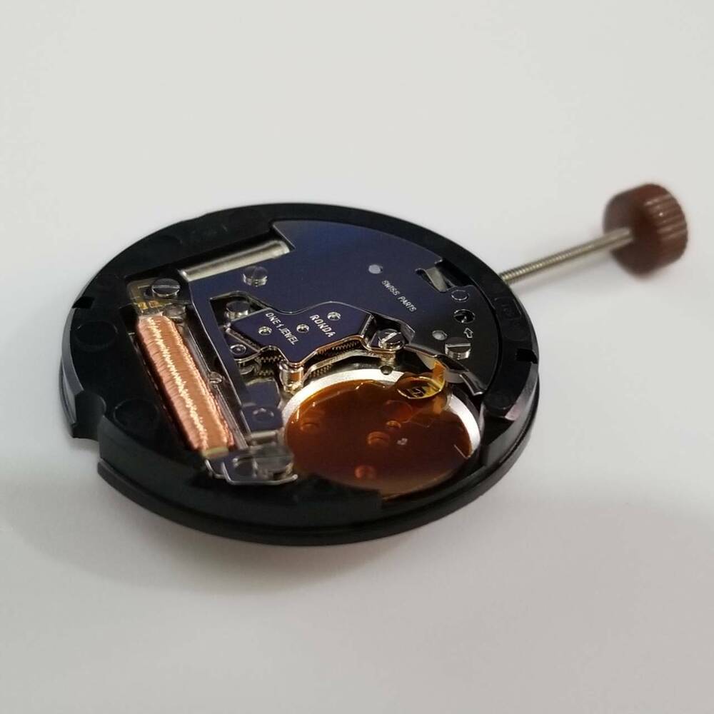 Ronda 503 quartz watch movement by Ronda, precise repair part for accurate timekeeping maintenance.