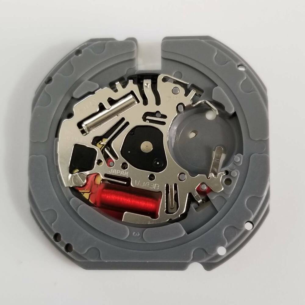 Hattori Epson TMI VJ43B quartz watch movement, precise Japan-made mechanism for accurate repairs.
