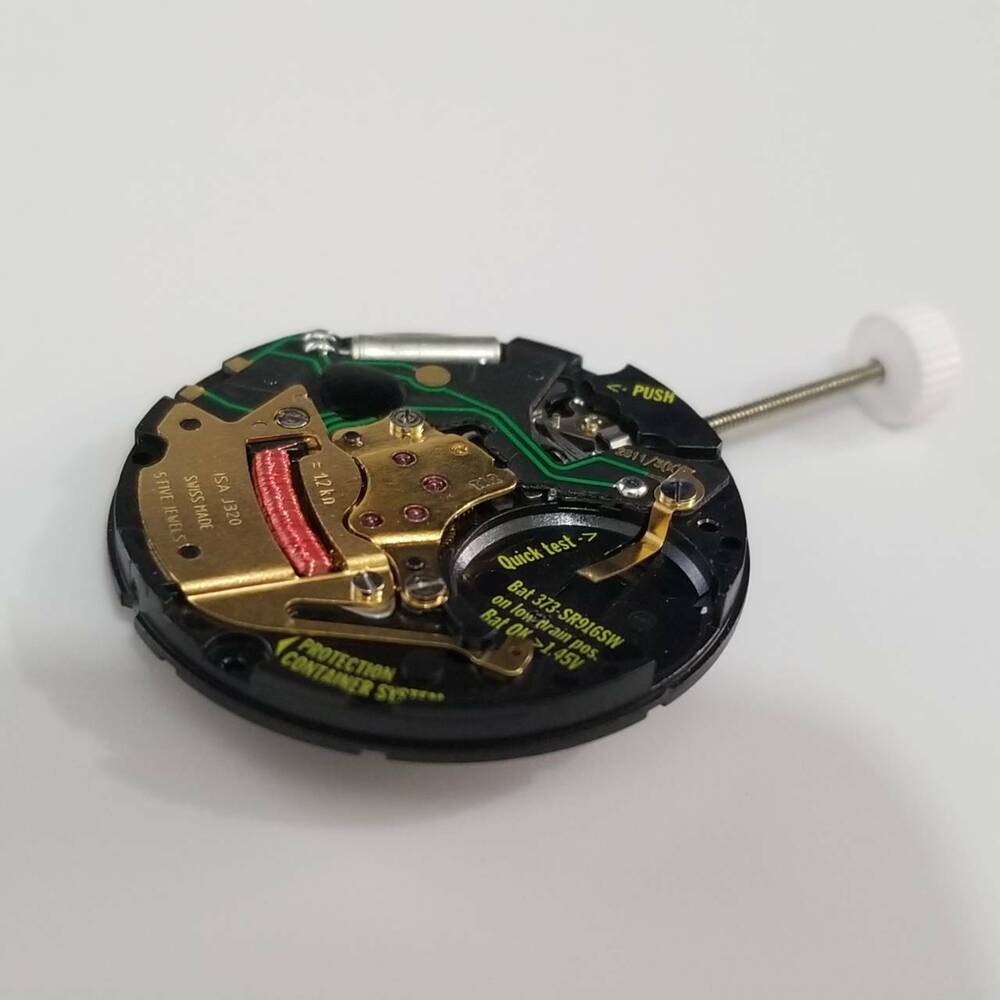 ISA J320/103 quartz watch movement, precise replacement part compatible with 330/103 models for accurate timekeeping.