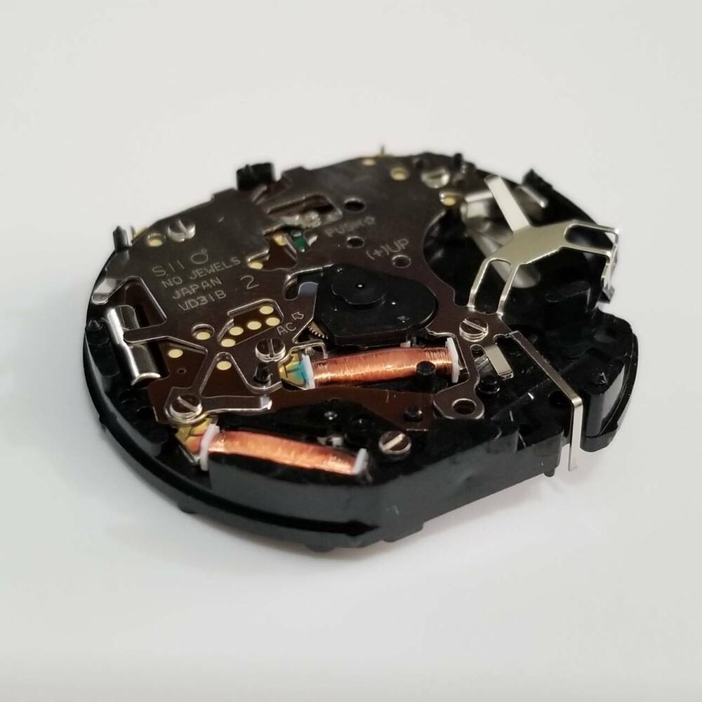 Hattori Epson VD31A quartz watch movement, Japanese precision mechanism for reliable timekeeping in watch accessories.