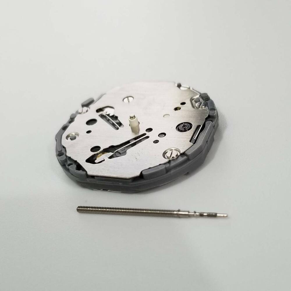 Hattori Epson TMI VD73A quartz watch movement, precision Japanese craftsmanship for watch repair.