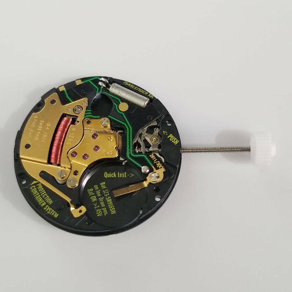 Close-up of ISA J320/103 quartz watch movement replacement part for precise timekeeping, compatible with model 330/103.