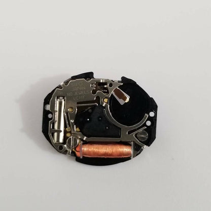 Hattori Epson VC11F quartz watch movement, precision Japan-made mechanism for reliable timekeeping.