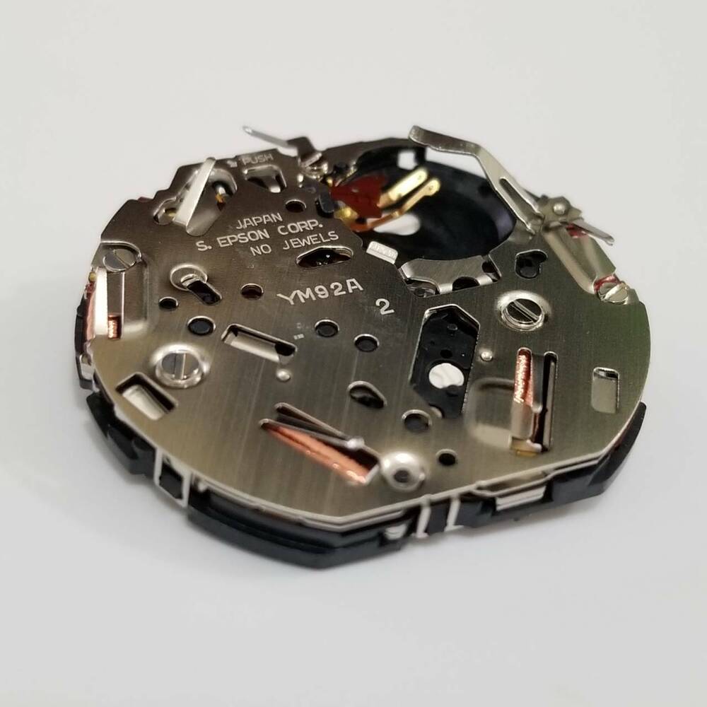 Epson YM92 quartz watch movement for accurate timekeeping in watch repair and maintenance.