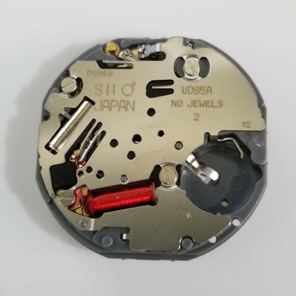 Hattori Epson VD85A quartz watch movement showing precise Japan-made mechanism for reliable timekeeping.