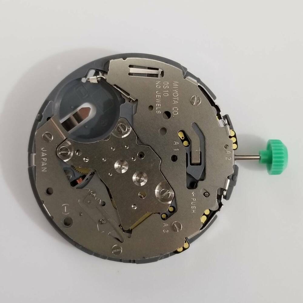Miyota 0S10 quartz watch movement showing intricate mechanism for precise timekeeping.