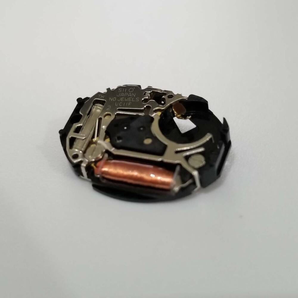 Hattori Epson VC11F quartz watch movement, Japan-made precision mechanism for reliable timekeeping and watch repair.