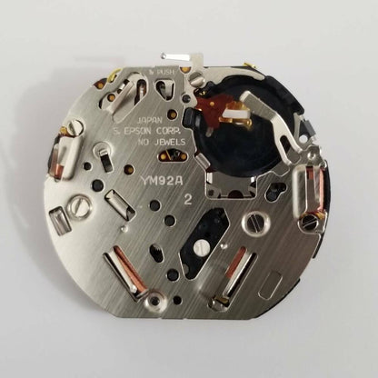 Epson YM92 quartz watch movement, precise replacement part for accurate timekeeping in watch repair.