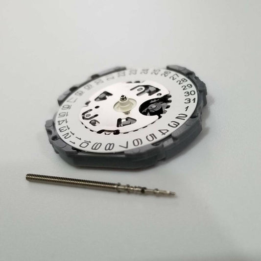 Hattori Epson TMI VJ12B quartz watch movement with date display at 3, Japan made precision.