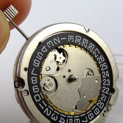 Seagull ST25 automatic watch movement showing small second at 9H with decorative perlage finish.
