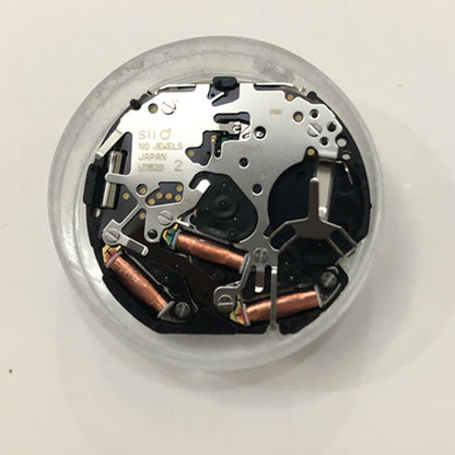 Hattori VD52B Japan Quartz watch movement, reliable precision for watch repairs and replacements.