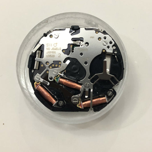 Hattori VD52B Japan Quartz watch movement, reliable precision for watch repairs and replacements.