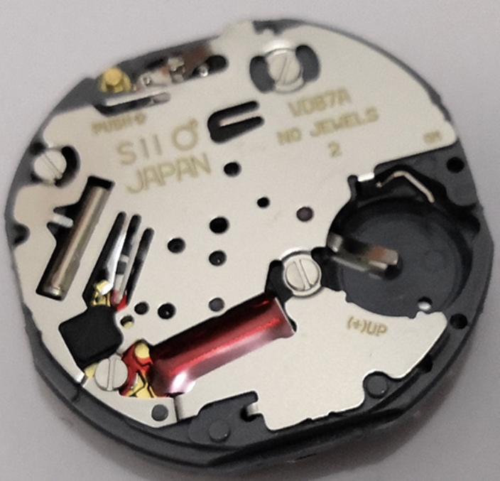 Hattori Epson TMI VD87A quartz watch movement, Japan-made precision mechanism for accurate timekeeping.