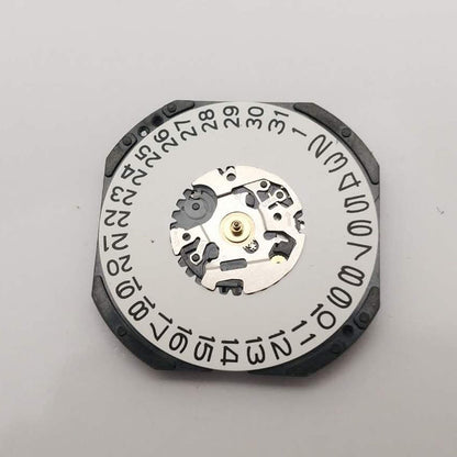 Shiojiri Hattori VX42 Quartz watch movement with day display at 3 and 6 o'clock, brand new.